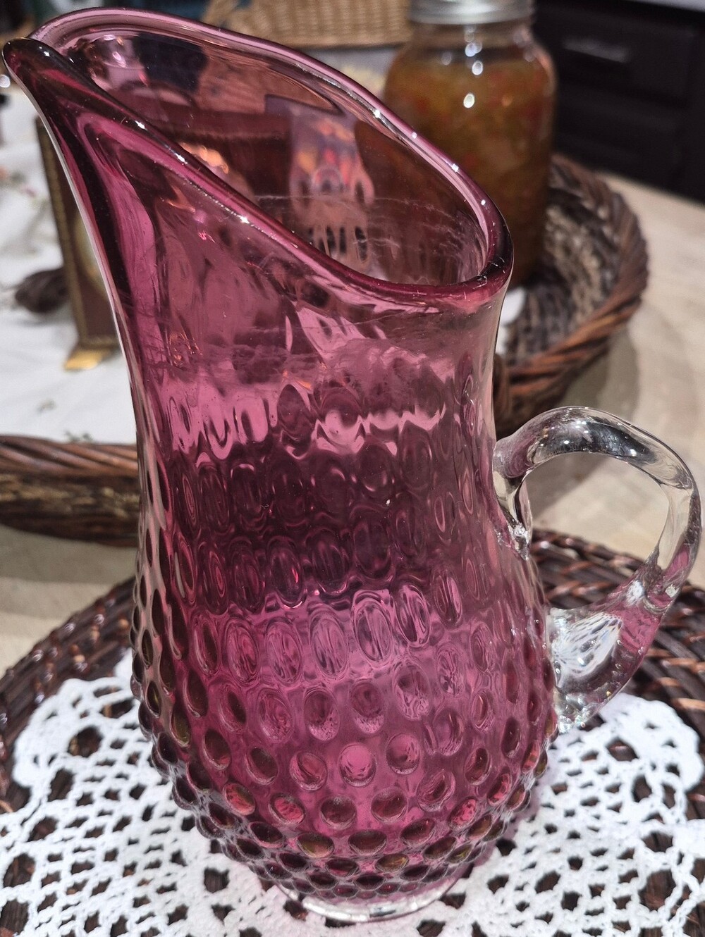 Vintage Cranberry or Plum Art glass pitcher featuring a hobnail (bump) Pattern